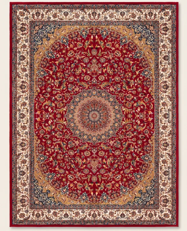 A deep red Persian medallion rug with a gold and indigo central design and ivory floral border.
