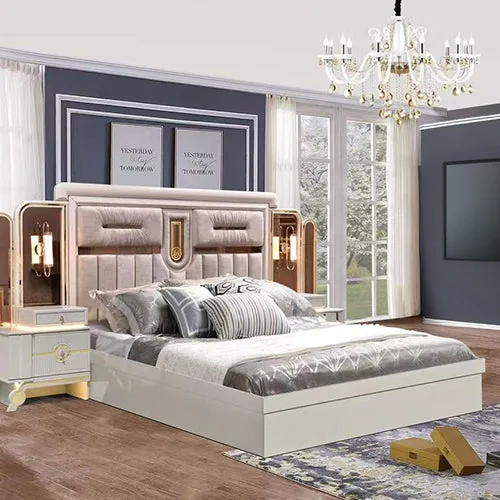 Classic upholstered bed with a tall panelled headboard and gold-finished trim.